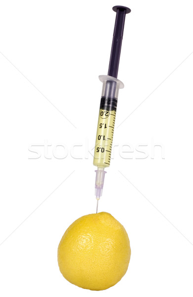 Lămâie fruct galben seringă fotografie dezvoltare Imagine de stoc © imagedb