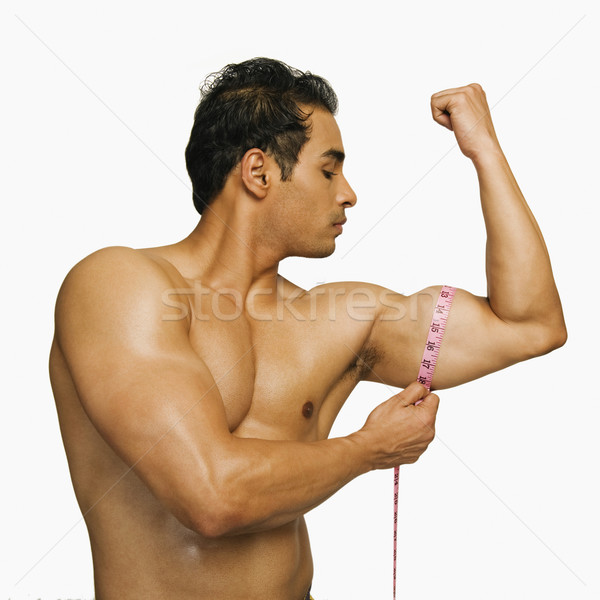 Primer plano hombre bíceps cinta métrica energía Foto stock © imagedb