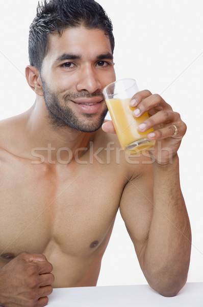 Retrato macho homem potável suco corpo Foto stock © imagedb