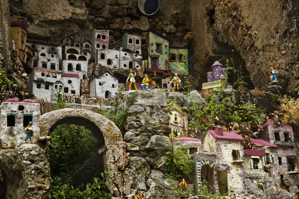 Miniature houses on the rocks Stock photo © imagedb