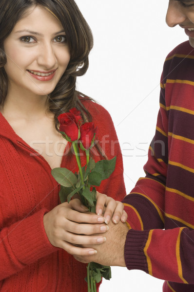 Couple femme fleur main amour [[stock_photo]] © imagedb