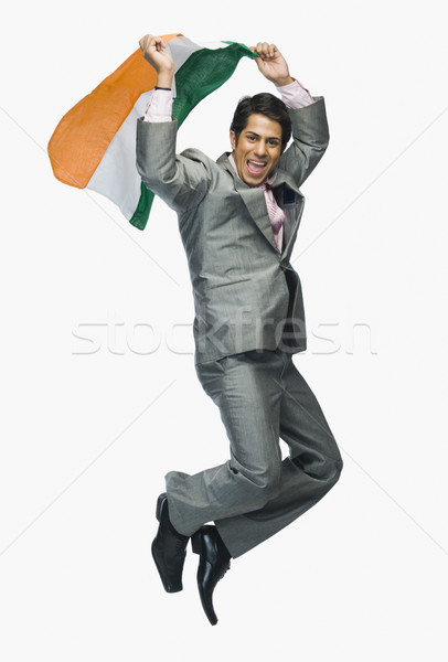 Empresário saltando indiano bandeira homem Foto stock © imagedb