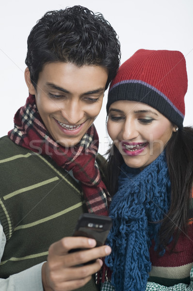 çift bakıyor cep telefonu konuşma erkek mutluluk Stok fotoğraf © imagedb
