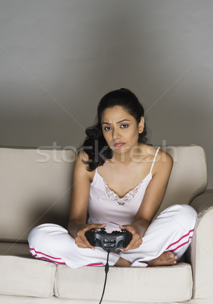 Portré fiatal nő játszik videojáték nő szépség Stock fotó © imagedb