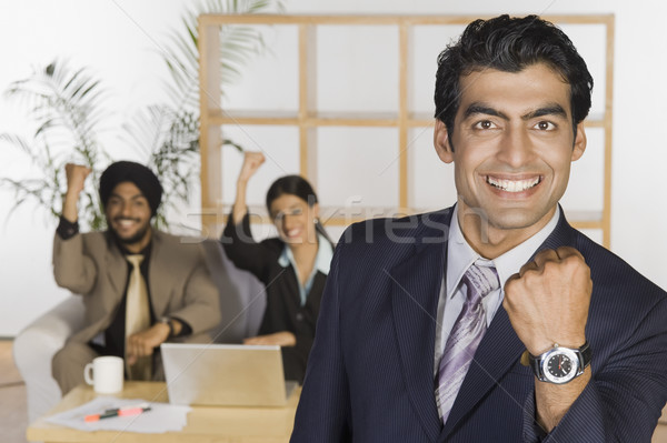 Business tonen vuist glimlachend kantoor Stockfoto © imagedb