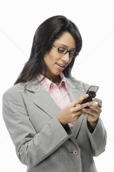 üzletasszony sms üzenetküldés nő szépség olvas vállalati Stock fotó © imagedb