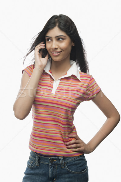 Közelkép nő beszél mobiltelefon fiatal mosolyog Stock fotó © imagedb