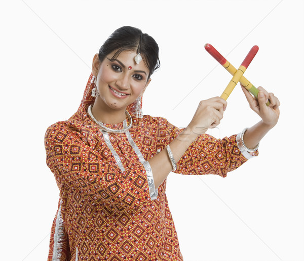 Woman performing Dandiya Raas at Navratri Stock photo © imagedb