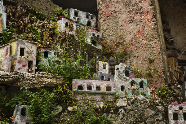 Miniature houses on the rocks Stock photo © imagedb