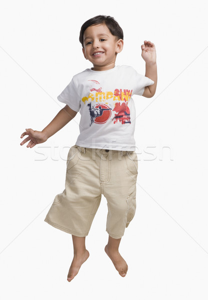 Baby jongen springen glimlachend cute verticaal Stockfoto © imagedb