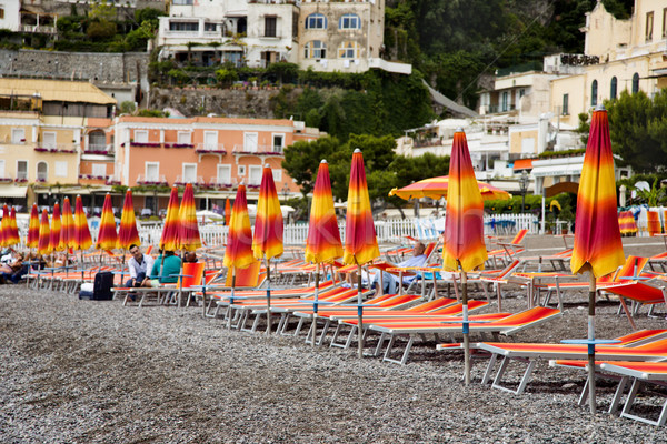 Beach umbrellas and lounge chairs on the beach Stock photo © imagedb