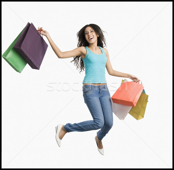 Mulher saltando trampolim jeans Foto stock © imagedb