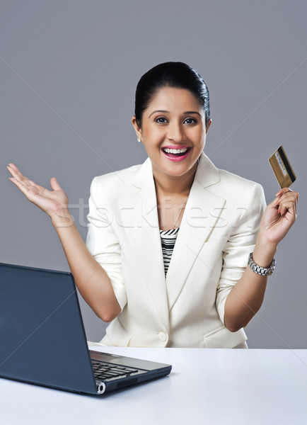 [[stock_photo]]: Femme · d'affaires · regarder · excité · achats · en · ligne · portable · affaires