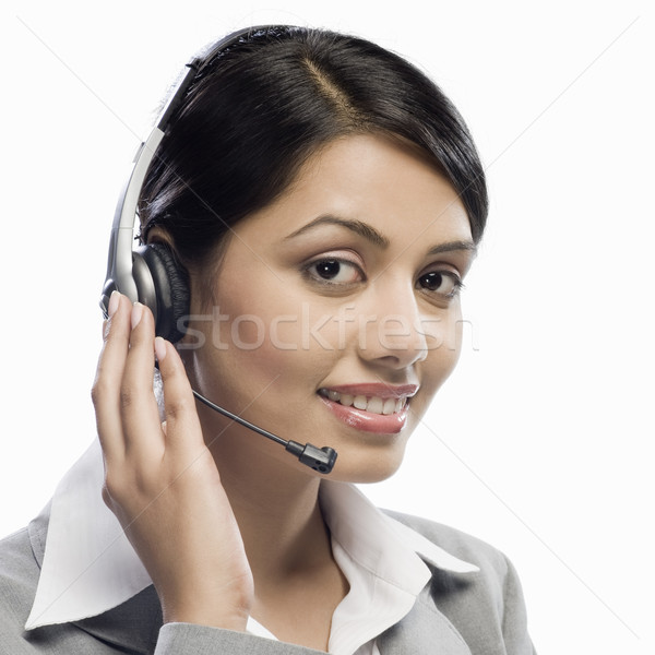 Weiblichen Kundenbetreuung Executive tragen Headset weiß Stock foto © imagedb