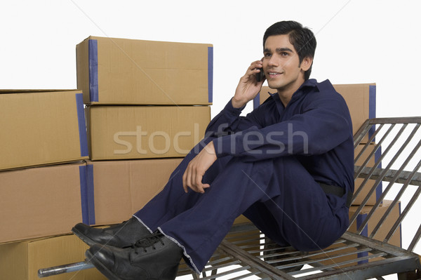 Bolt ül kéz teherautó beszél mobiltelefon Stock fotó © imagedb