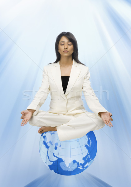 Mujer de negocios meditando mundo mujer belleza yoga Foto stock © imagedb