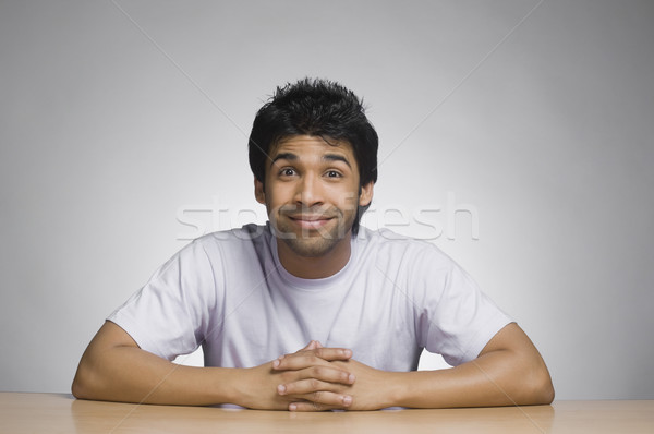 Portré férfi készít arc mosolyog férfi Stock fotó © imagedb