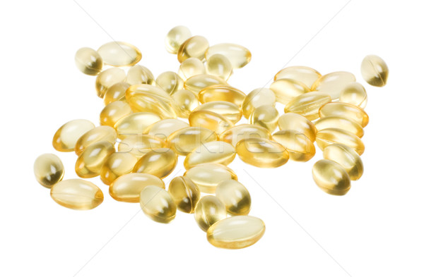 Közelkép halolaj kapszulák tabletta megoldás izolált Stock fotó © imagedb