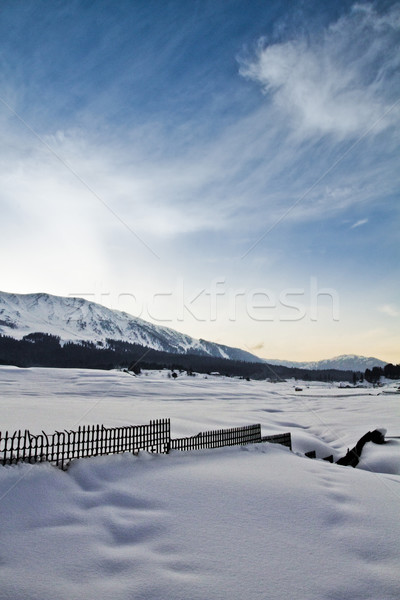 Snow covered landscape with mountain range in the background, Ka Stock photo © imagedb