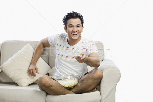 человека Смотря телевизор весело диване развлечения Сток-фото © imagedb