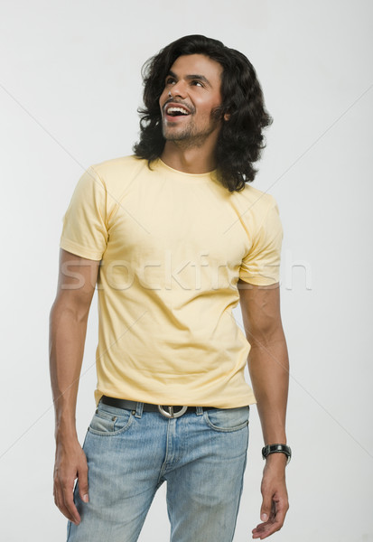 Közelkép férfi nevet divat farmer póló Stock fotó © imagedb