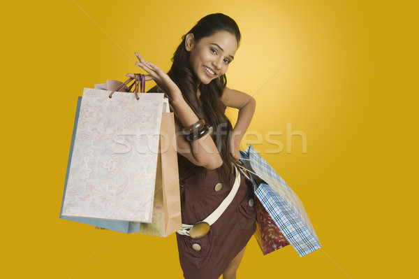 Femme jeunes souriant jaune [[stock_photo]] © imagedb