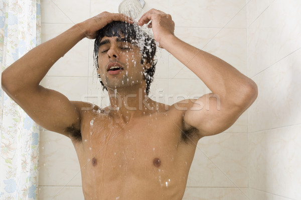 Człowiek prysznic domu kąpieli Zdjęcia stock © imagedb