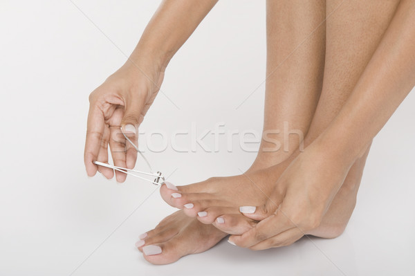 Mujer jóvenes limpieza uno horizontal fondo blanco Foto stock © imagedb