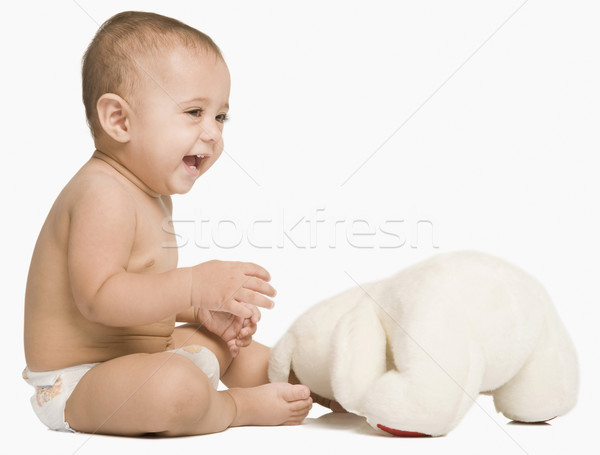 ストックフォト: 赤ちゃん · 少年 · 演奏 · おもちゃ · 笑みを浮かべて · 座って