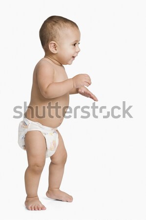 Baby jongen kruipen glimlachend cute Stockfoto © imagedb
