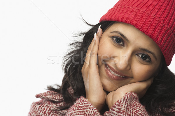 Portrait femme souriante tête mains femme mode [[stock_photo]] © imagedb