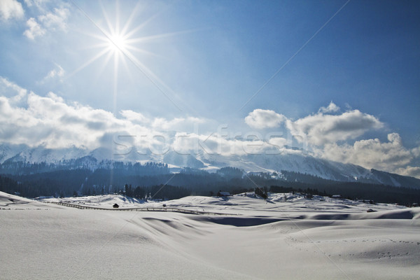Stock photo: Snow covered landscape with mountain range in the background, Ka