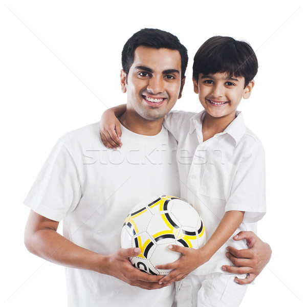 [[stock_photo]]: Portrait · heureux · père · en · fils · football · famille · amusement
