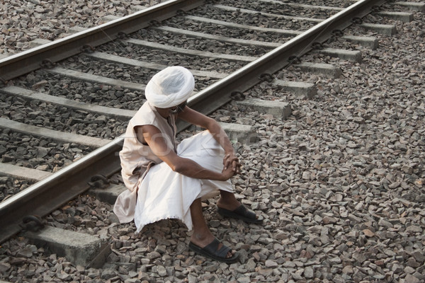 Férfi ül vasút útvonal fotózás kint Stock fotó © imagedb