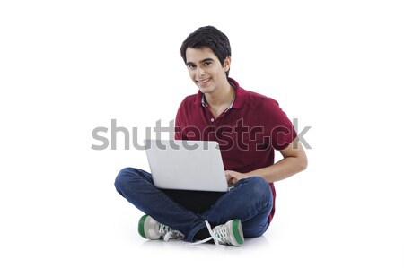 Boldog férfi laptopot használ laptop kommunikáció fiatal Stock fotó © imagedb