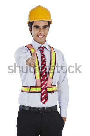 Businessman extending hand for handshake Stock photo © imagedb