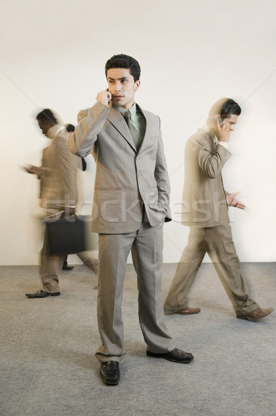 Foto stock: Empresário · falante · telefone · móvel · colegas · negócio · comunicação