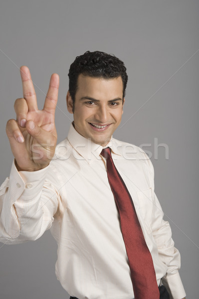 портрет бизнесмен победу знак связи Сток-фото © imagedb