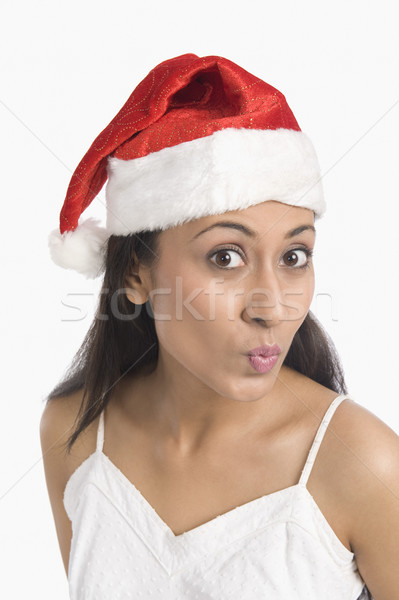 Közelkép nő visel mikulás kalap portré Stock fotó © imagedb