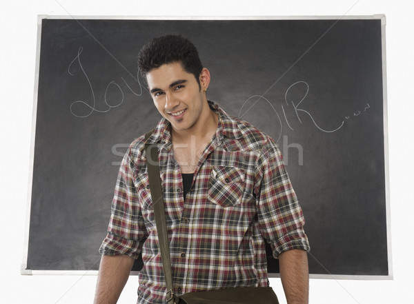 Egyetemi hallgató mosolyog osztályterem férfi oktatás portré Stock fotó © imagedb