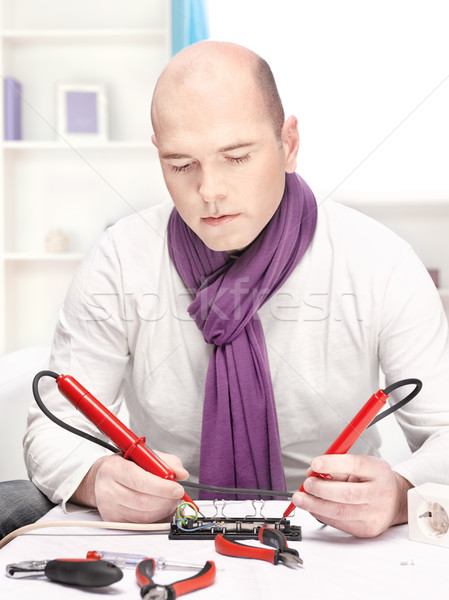 man doing minor repair at home Stock photo © imarin