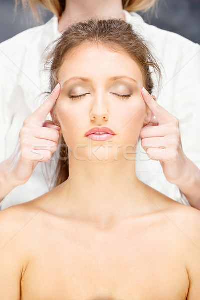 Femme tête massage jolie femme traitement visage [[stock_photo]] © imarin