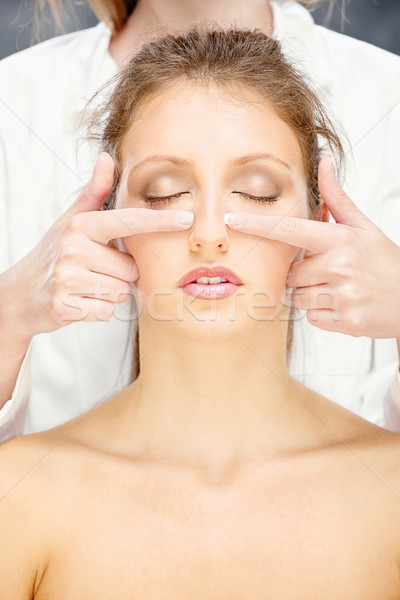 Femme tête massage jolie femme traitement visage [[stock_photo]] © imarin