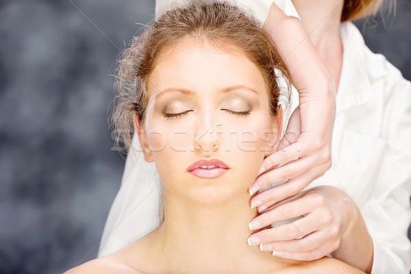 Femme tête massage jolie femme traitement visage [[stock_photo]] © imarin