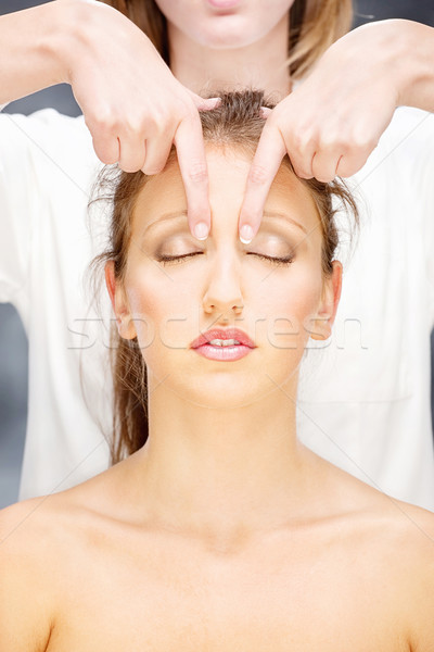 Femme tête massage jolie femme traitement visage [[stock_photo]] © imarin