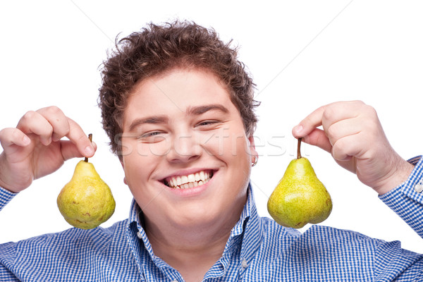 Chubby boy and pear Stock photo © imarin