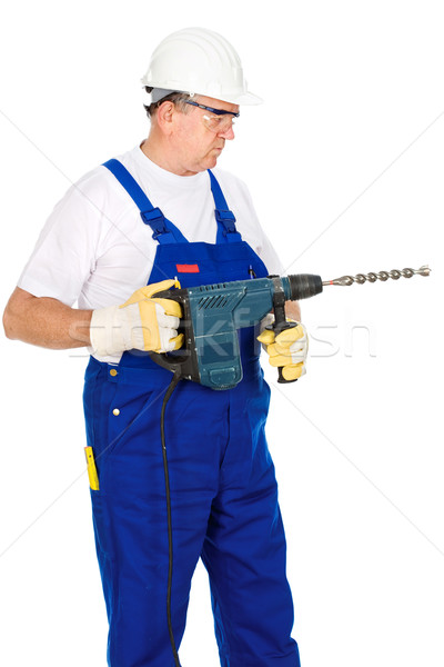 man wearing worker suite holding drill for concrete Stock photo © imarin