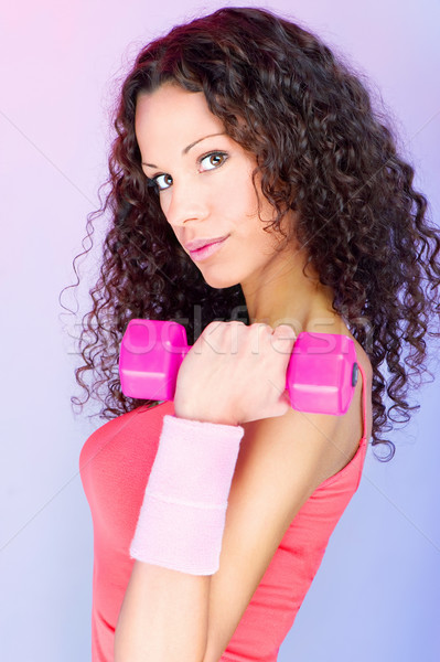 curls hair girl holding weight for exercise Stock photo © imarin