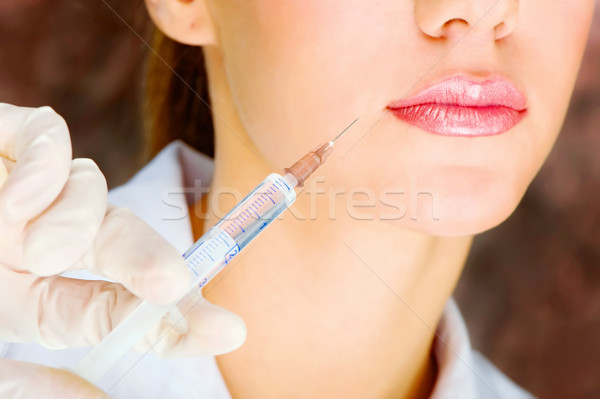 Injekciós tű botox kéz kesztyű tart helyes Stock fotó © imarin