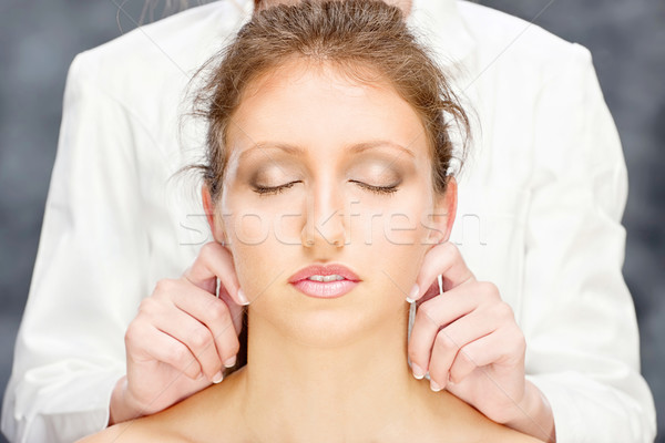 Femme tête massage jolie femme traitement visage [[stock_photo]] © imarin